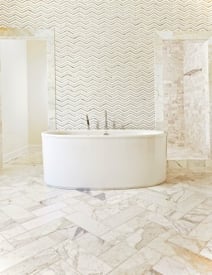 bathroom, tile, glasstile, stand alone bathtub, waterjet, tile pattern, wall tile, feature wall, chevron, art glass